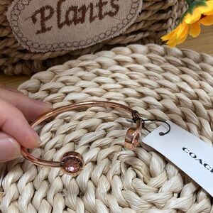 Coach Rose Gold Open Cuff Bracelet with Logo End Caps